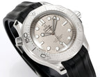 Omega watch with silver dial, baton markers, and black rubber strap, angled view