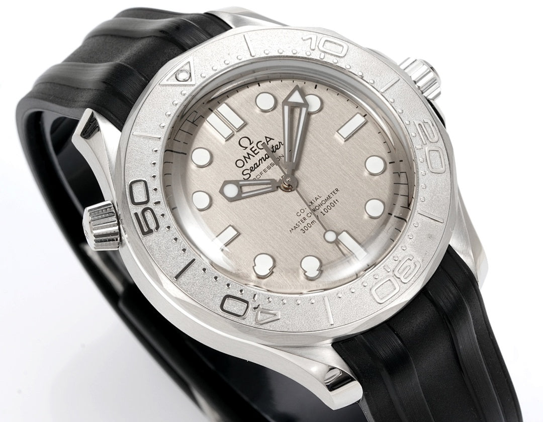Omega watch with silver dial, baton markers, and black rubber strap, angled view