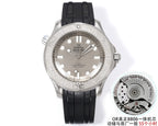 Omega Seamaster diving watch with silver dial, black bezel, and black rubber strap