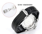 Omega watch with black rubber strap, side view and strap clasp close-up