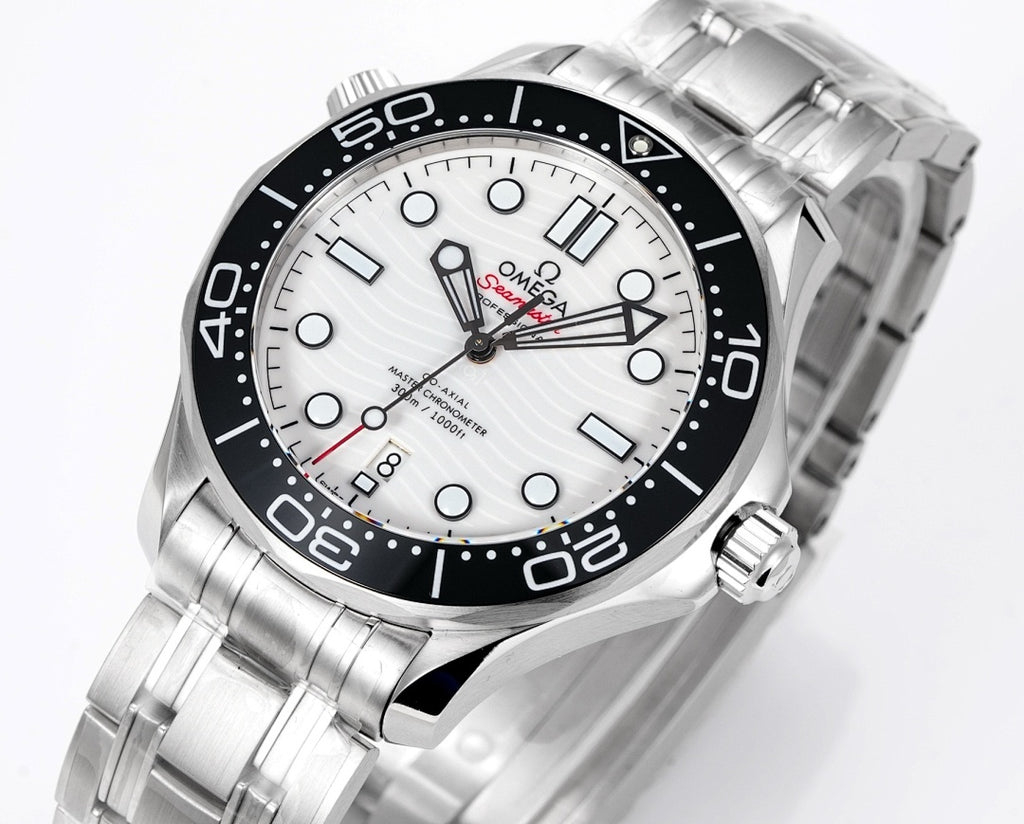 Men's Omega Seamaster close-up, white dial with black bezel markers, steel bracelet.