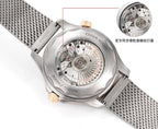 Omega watch with see-through caseback, exposed movement, metal mesh strap