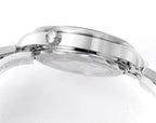 Stainless steel diver watch side view with crown and engraved bezel edge.