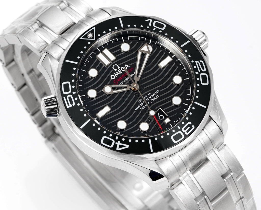 Stainless steel diver watch angled front with black dial, hands, and metal bracelet.