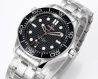 Stainless steel diver watch close-up angled front with black dial and bezel minute marks.