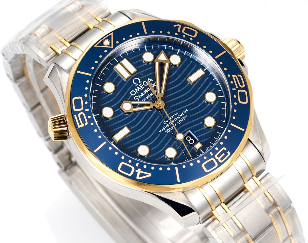Omega dive watch angled view with blue dial, gold hands, two-tone metal bracelet