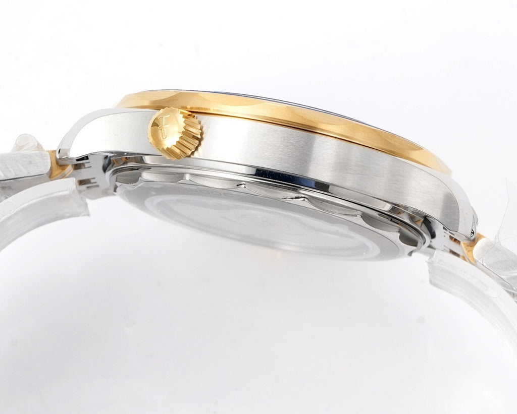 Omega watch case profile with gold bezel ring, blue bezel insert, and two-tone stainless bracelet