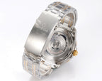 Omega watch side view with blue dial, gold crown, two-tone stainless bracelet and bezel