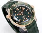 Omega watch angled view with green dial, gold-tone bezel, and rose-gold hands
