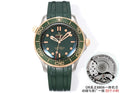 Omega watch with green dial, green rubber strap, and gold-tone bezel and case