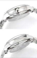 Omega Watches wristwatch case close-up with polished silver finish