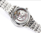 Omega Watches wristwatch with silver caseback and visible movement