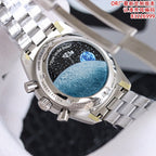 Stainless steel Omega chronograph watch with dark dial and blue-toned detail, silver bracelet.