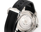 Omega watch side view with black strap and visible caseback window.
