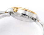Omega diver watch side profile with gold crown and two-tone bezel and case.