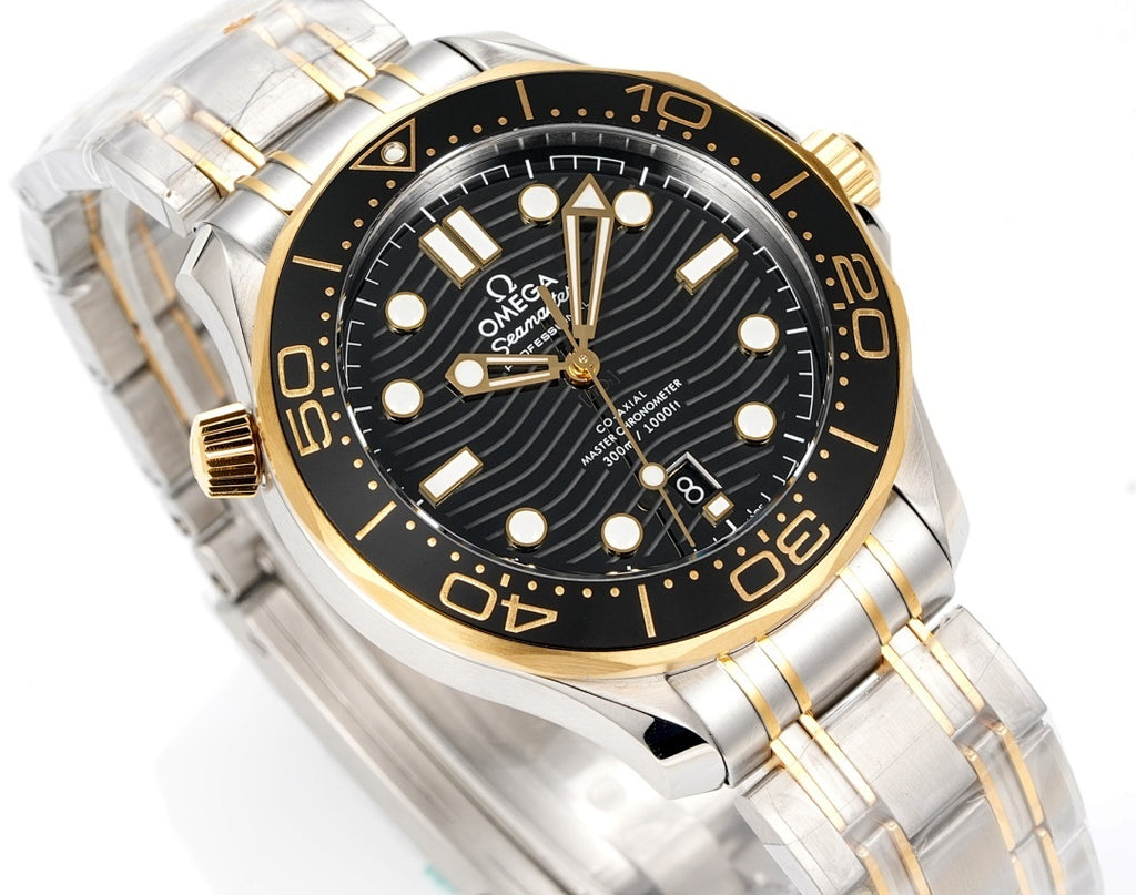 Omega diver watch front angled view with black dial, gold hands, and two-tone bracelet.