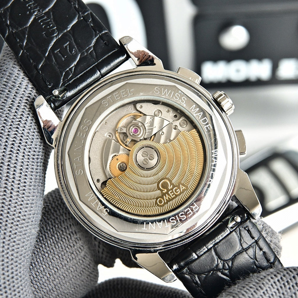 Omega Seamaster watch caseback showing gold-toned movement through transparent cover
