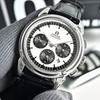Omega Seamaster chronograph watch on grey glove, white dial and black leather strap