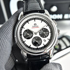 Omega Seamaster chronograph watch front view, black leather strap and white dial