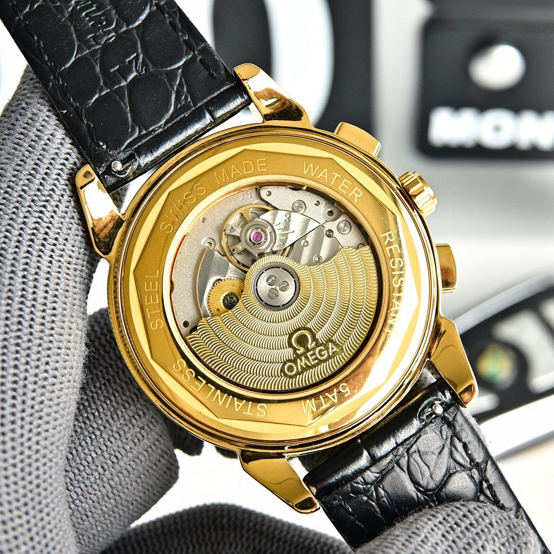 Omega Seamaster gold-tone case back on black leather strap, engraved dial back