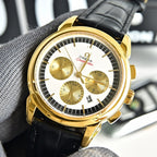 Omega Seamaster gold-tone chronograph wristwatch with black leather strap and white dial