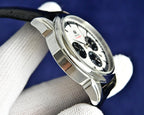 Omega Seamaster watch side view with silver case and black leather strap