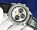 Omega Seamaster chronograph watch on black leather strap with white dial and subdials