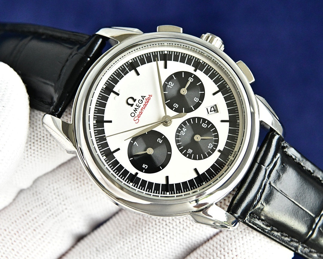 Omega Seamaster chronograph watch on black leather strap with white dial and subdials