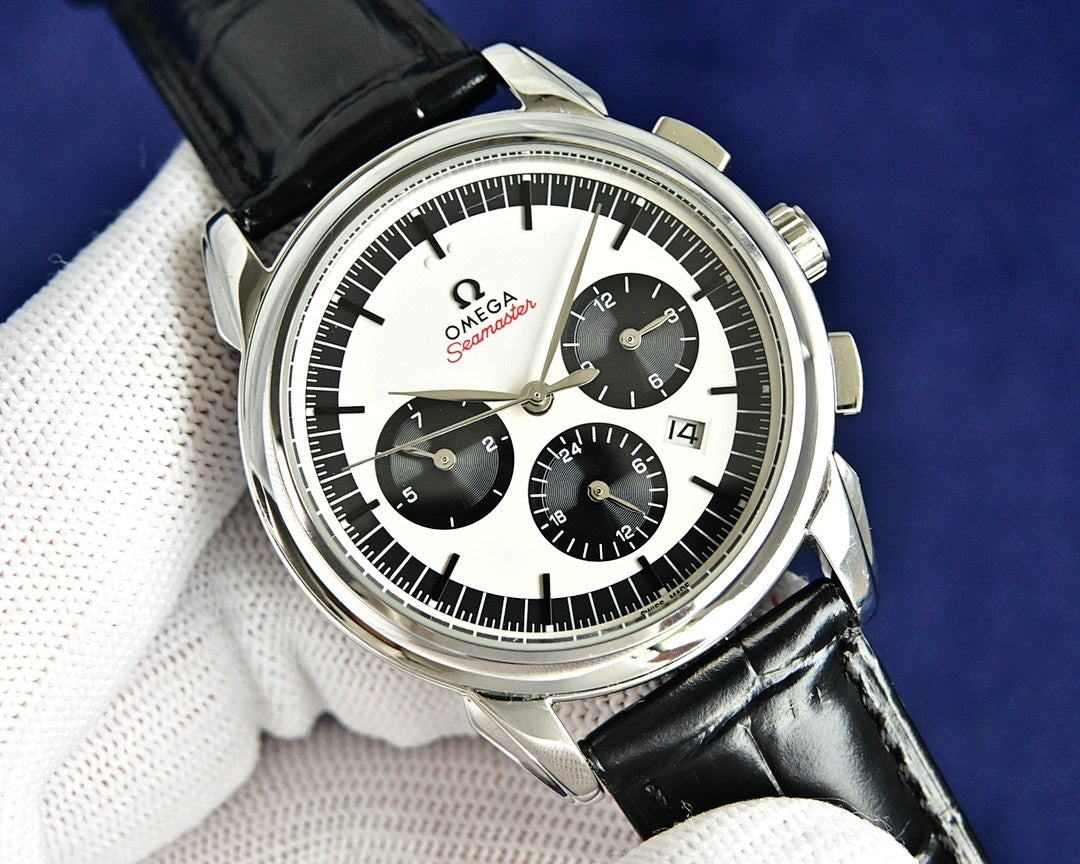 Omega Seamaster chronograph watch with black leather strap, silver case, white dial