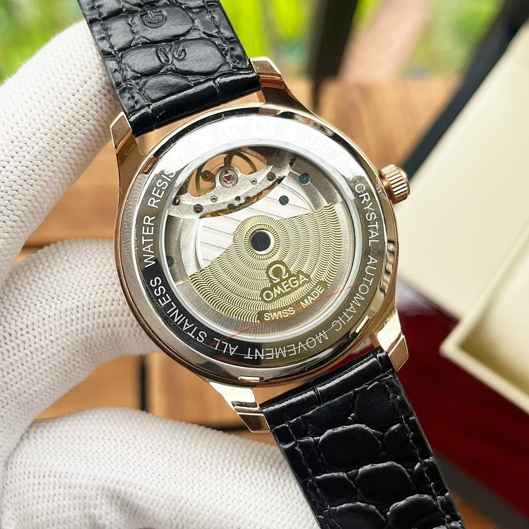 Omega De Ville wristwatch caseback view with engraved bezel and black leather strap.