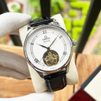 De Ville wristwatch with black leather strap and white dial, silver case
