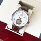 De Ville wristwatch with brown leather strap, white dial, silver case