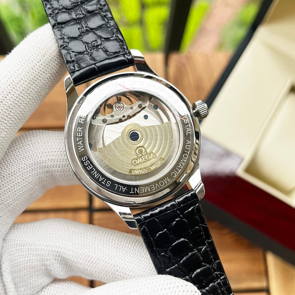 De Ville wristwatch caseback with see-through movement window, black strap