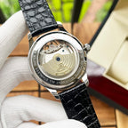 De Ville wristwatch caseback with see-through movement window, black strap