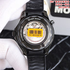 Diver watch caseback in black with screws and barcode label