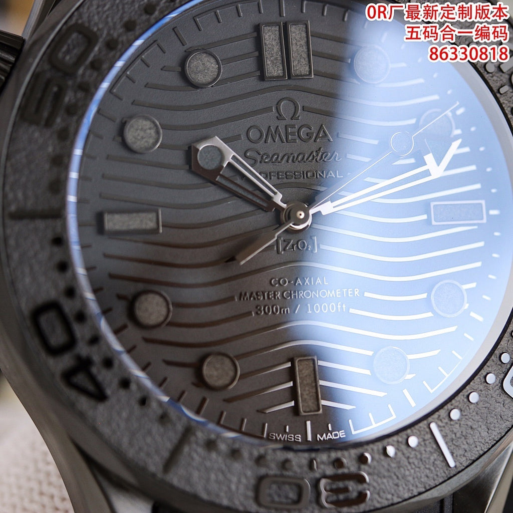 Diver watch dial close-up with Omega logo, baton hour marks, dark textured case