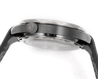 Black diver watch case and bezel close-up with brushed metal finish.