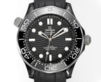 Black dial diver watch with stainless bezel and black rubber strap.