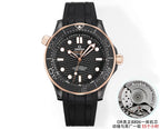 Black rubber diver watch with rose-gold bezel, black dial; side movement insert shown.