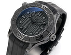 Omega Seamaster watch dial close-up with black textured pattern and luminous markers.