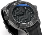 Omega Seamaster watch dial angled view with black textured pattern and metal hands.