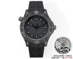 Omega Seamaster watch front view with black dial and matching rubber strap, steel accents.