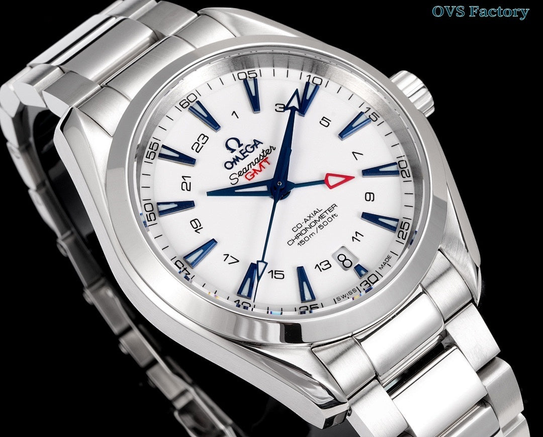 Silver wristwatch with white dial, blue hour markers, blue hands, red seconds triangle.
