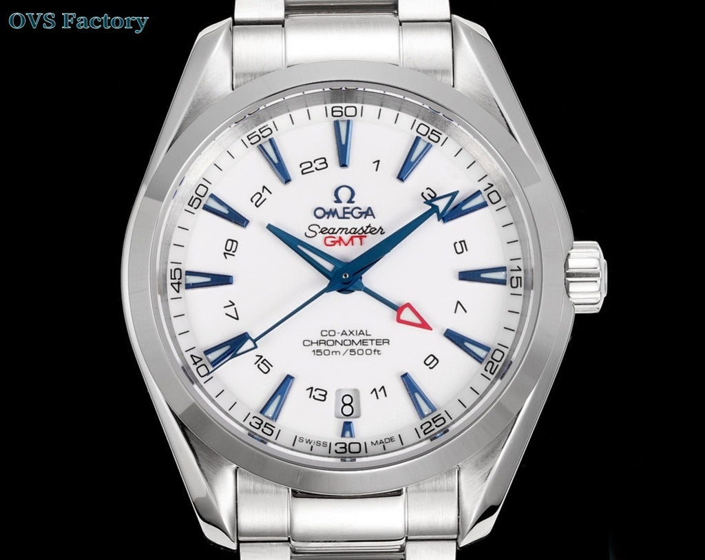 Silver wristwatch with white dial, blue hour markers, blue hands, red triangle, metal bracelet.