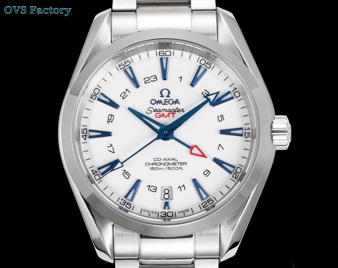 Silver wristwatch with white dial, blue hour markers, blue hands, red triangle, metal bracelet.