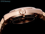 Omega Seamaster GMT wristwatch back view with rose-gold case and engraved center