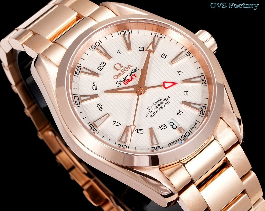 Omega Seamaster GMT wristwatch front close-up with rose-gold bezel and white dial