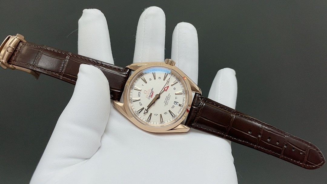 Analog wristwatch with white dial and brown leather strap, angled on display