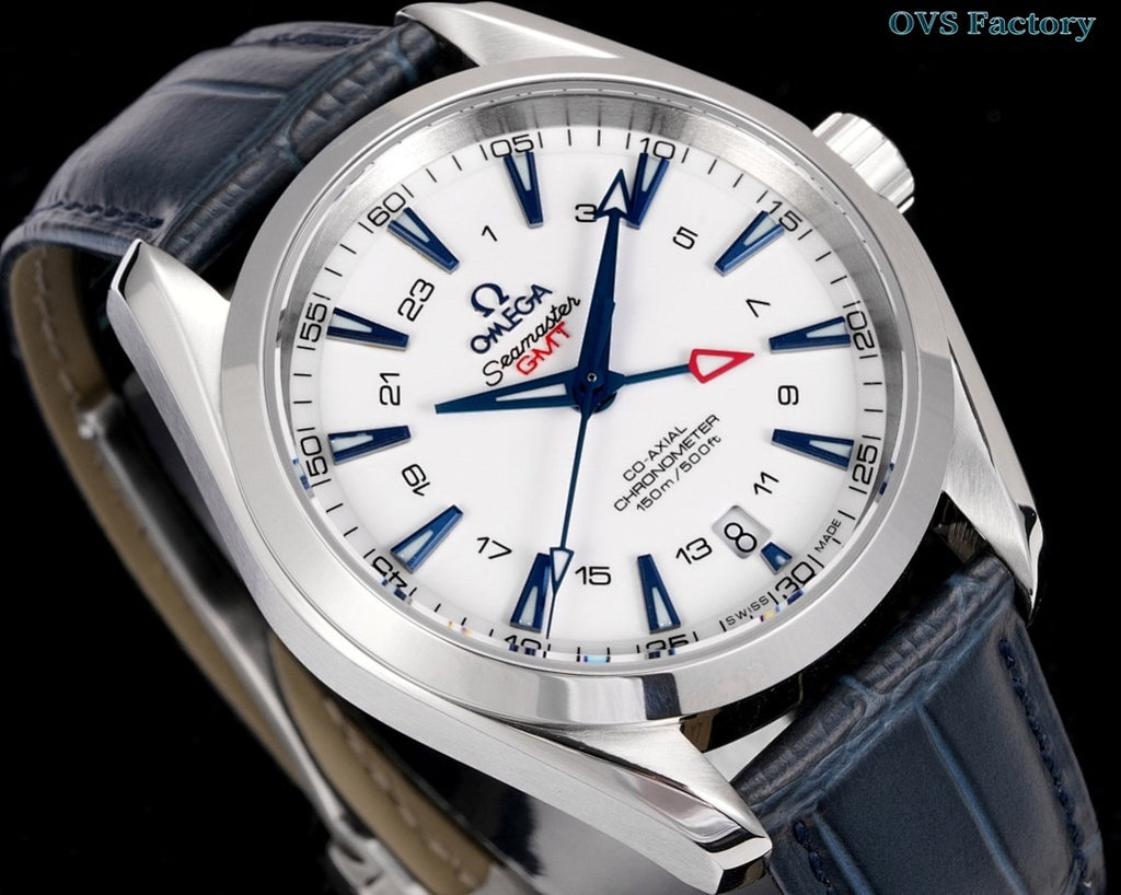 Stainless steel wristwatch close-up with white dial, blue hands, and dark leather strap
