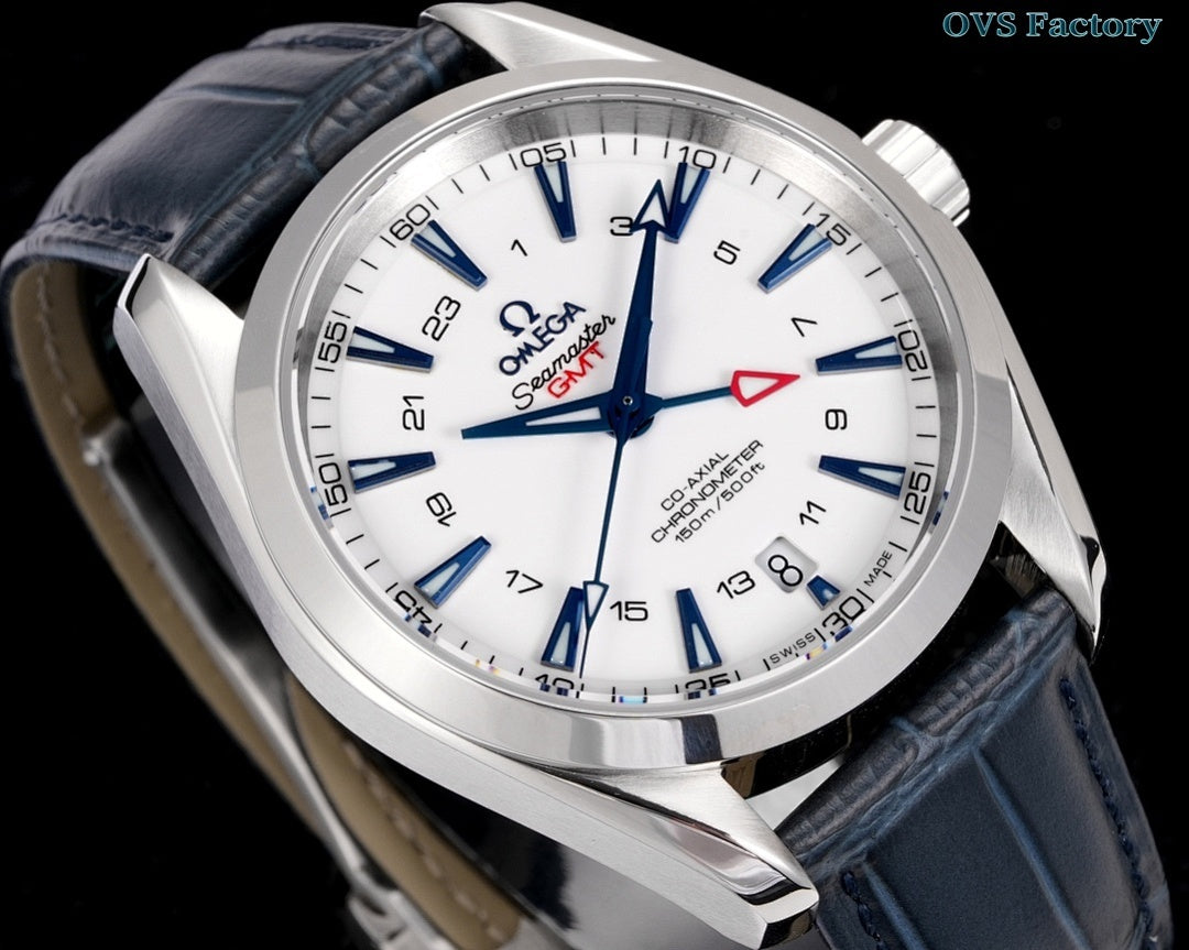 Stainless steel wristwatch close-up with white dial, blue hands, and dark leather strap